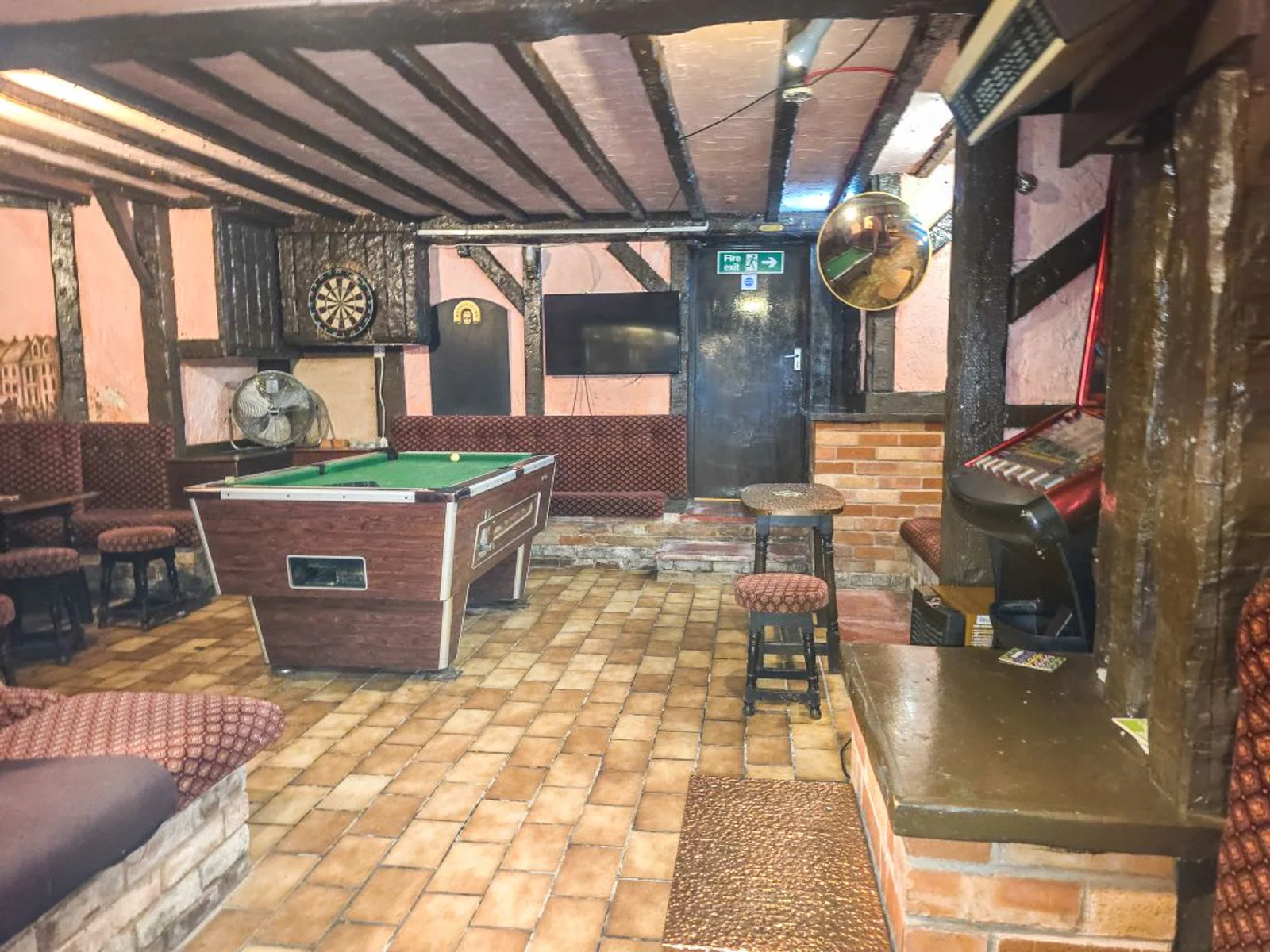 The basement bar and pool table at The Manuela Rose